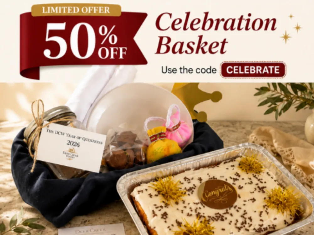 Limited offer — 50% off the Deer Creek Winery Celebration Basket with code CELEBRATE; basket with fresh cake, chocolates, and party favors