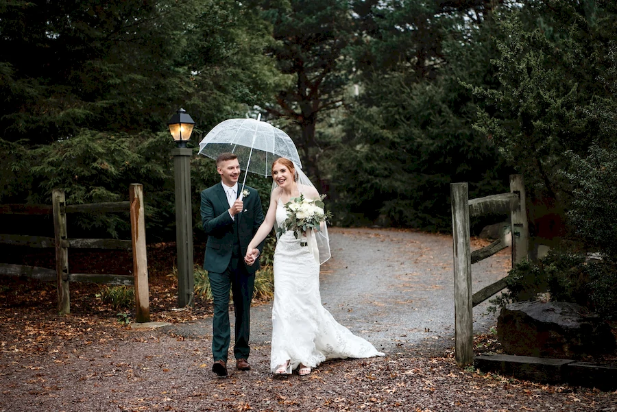 bride and groom entering the parking lot