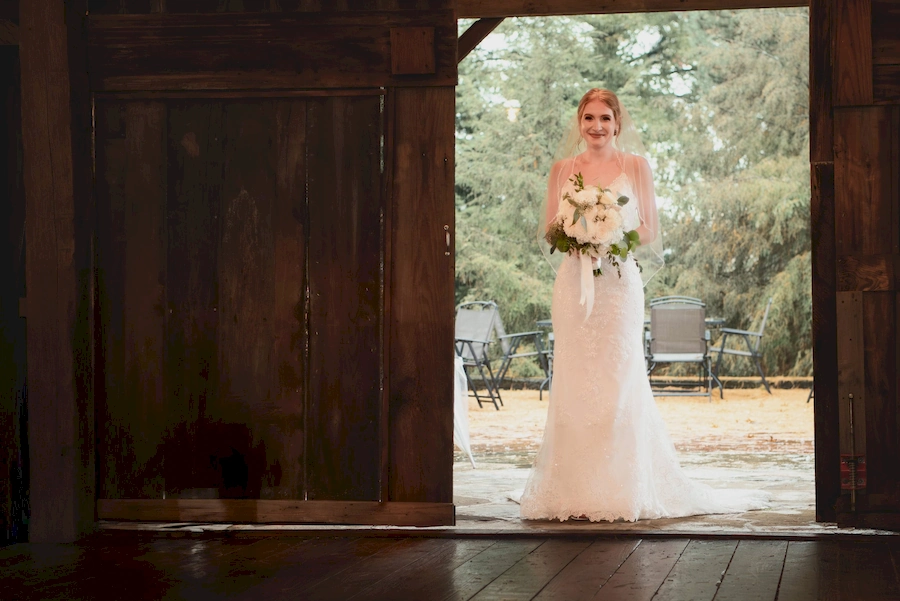 bride entering the barn