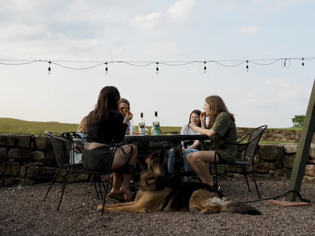 Host An Event at Watson Estate people eating at firepit