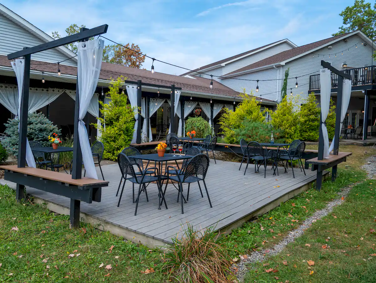 Compare Estates outside sitting area at deer creek winery at brooks estate