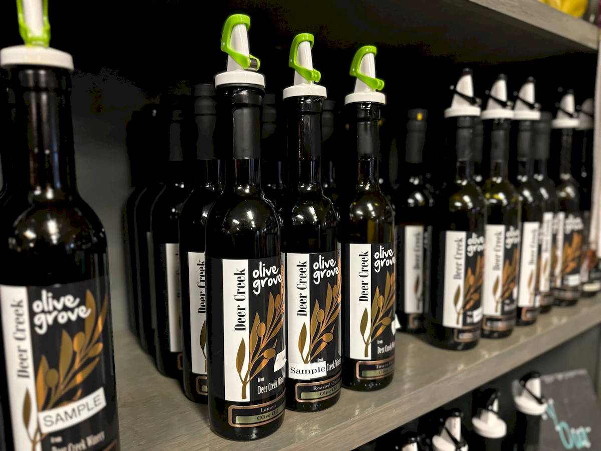Compare Estates olive grove olive oil and balsamic vinegar at deer creek winery at brooks estate tasting room