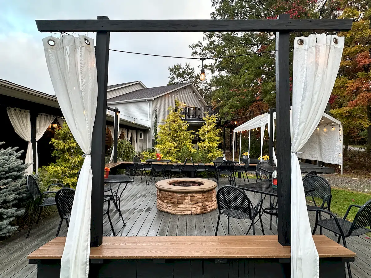 Compare Estates outside sitting area & firepit at deer creek winery at brooks estate