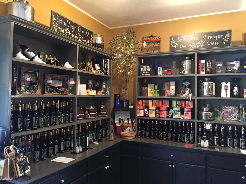 Compare Estates olive grove olive oil and balsamic vinegar at deer creek winery at brooks estate tasting room