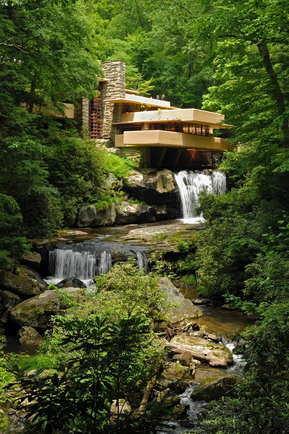 Mill Run, PA, USA - June 13, 2024: Designed in 1935 by architect Frank Lloyd Wright, Fallingwater is cantilevered over a waterfall in Pennsylvania's Laurel Highlands.