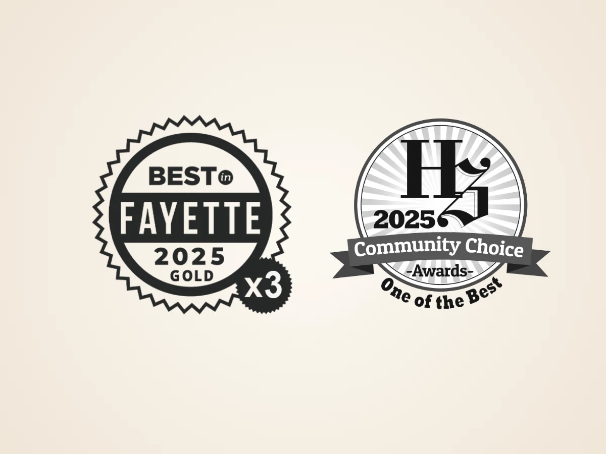 Our Story Best in Fayette 2025 Gold and 2025 Herald-Standard Community Choice Awards badges for Deer Creek Winery