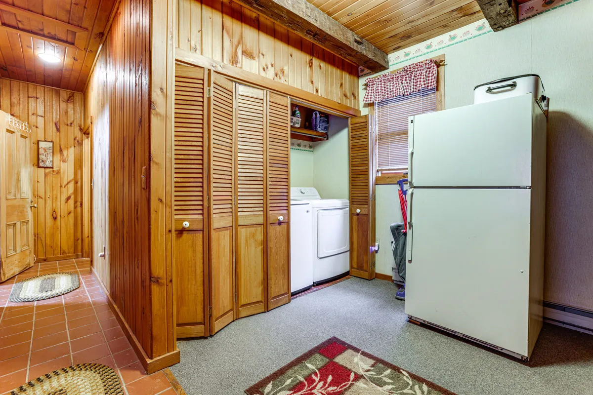 woodland manor Laundry area with refrigerator, washer and dryer
