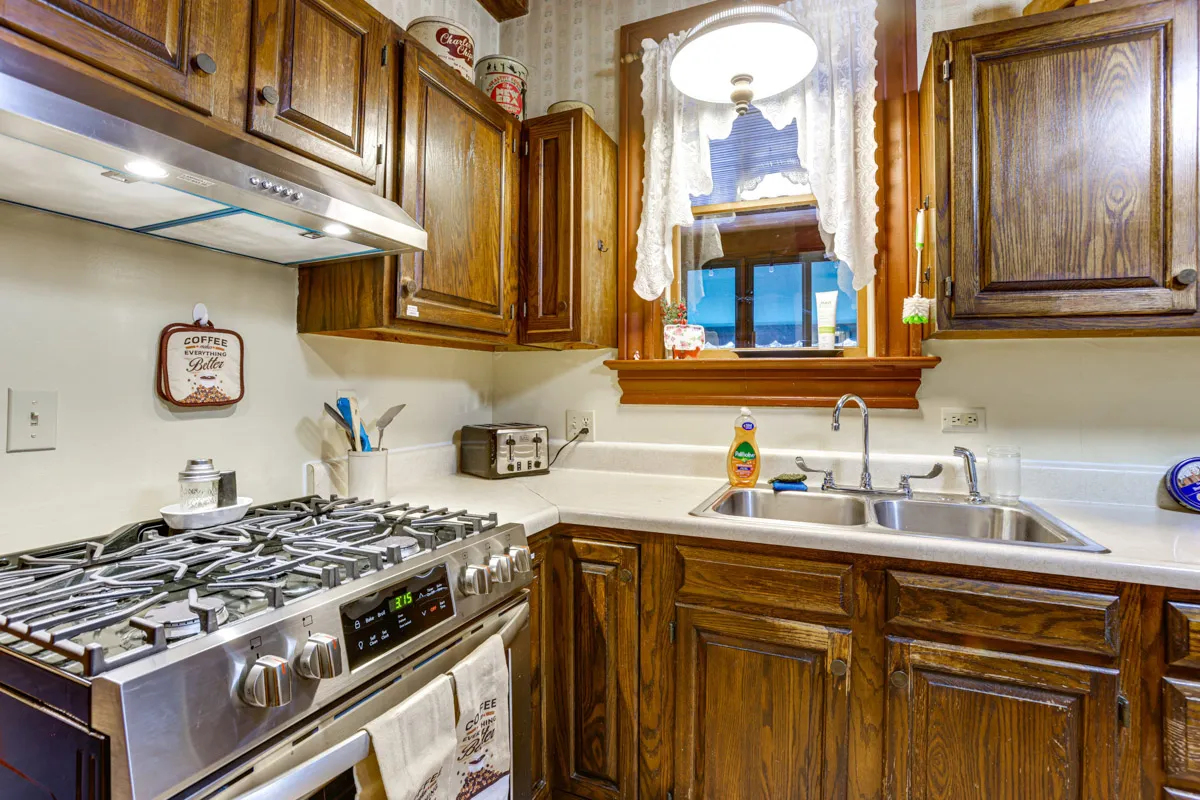 woodland manor kitchen view of stove and sink