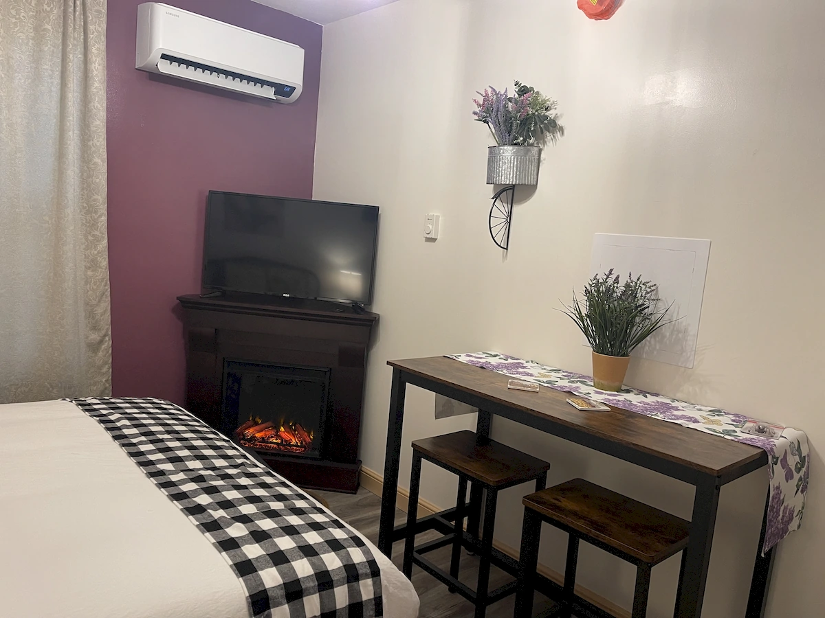 lavender and lemon farm room tv & sitting area/table