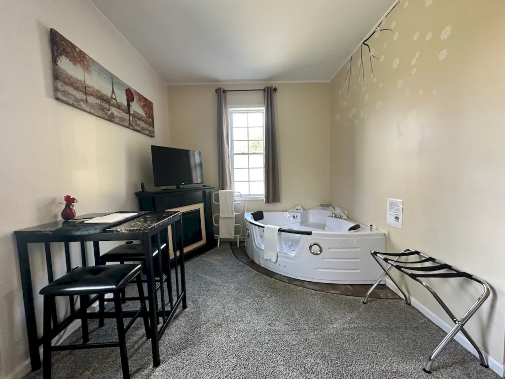 winter in paris room tv, chairs, in room hot tub