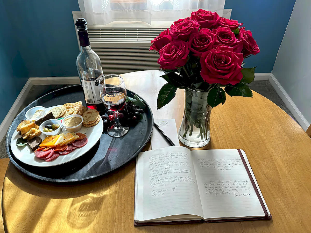 flowers, deer creek wine, and grazing plate at brooks estate