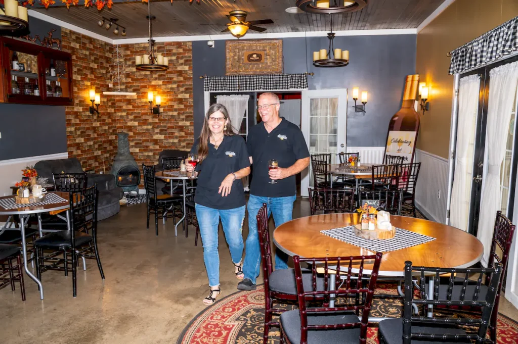 denis and rhonda brooks at vino's den | deer creek winery at brooks estate