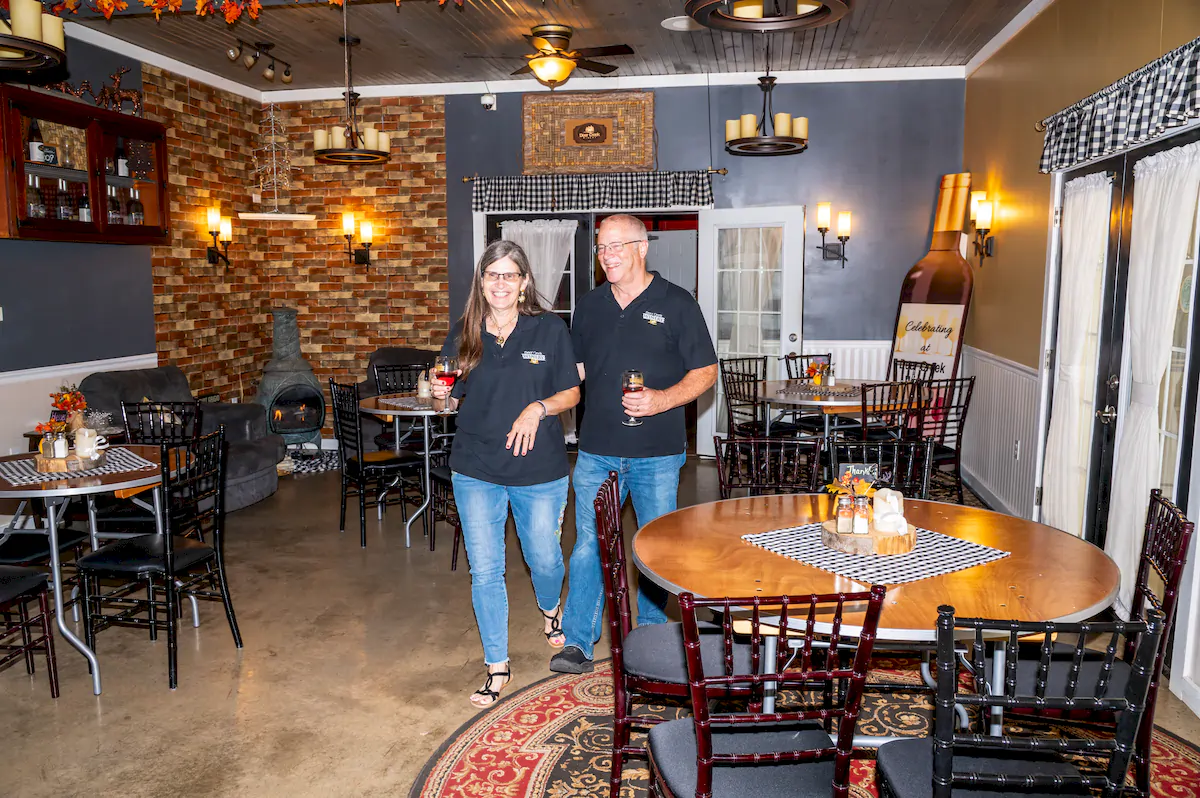 denis and rhonda brooks at vino's den | deer creek winery at brooks estate