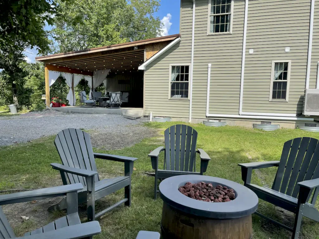 firepit and outdoor seating area by the manor at brooks estate