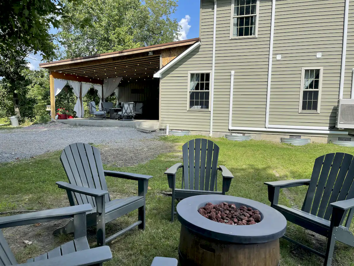 firepit and outdoor seating area by the manor at brooks estate