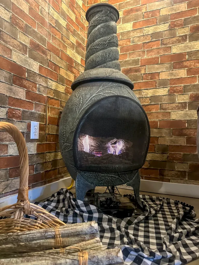 corner brick wall above seating area vino's den at brooks estate at deer creek winery