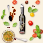 Deer Creek Olive Grove Espresso Balsamic Vinegar with fresh basil, cherry tomatoes, and a signature dipping blend at Deer Creek Winery